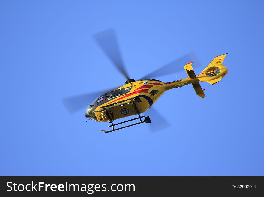 Yellow Hellicopter Flying
