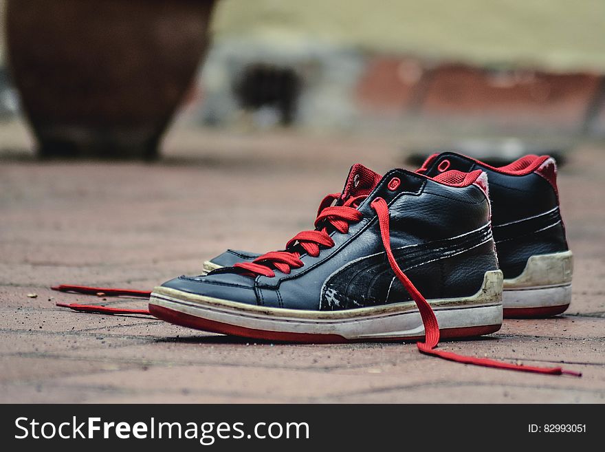 Black and Red Leather Puma Lace Up High Top Shoes