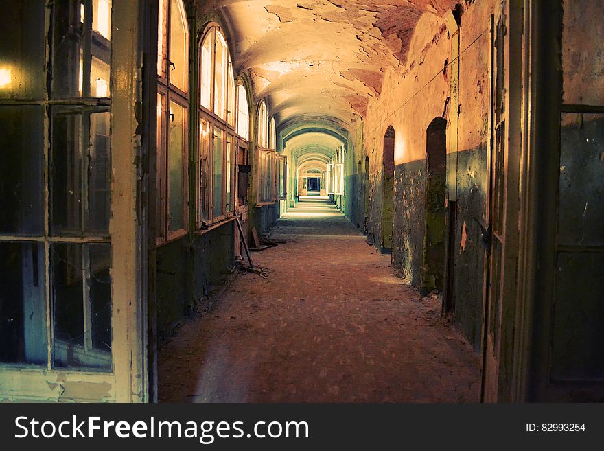 Interior of old house with decay along corridor. Interior of old house with decay along corridor.