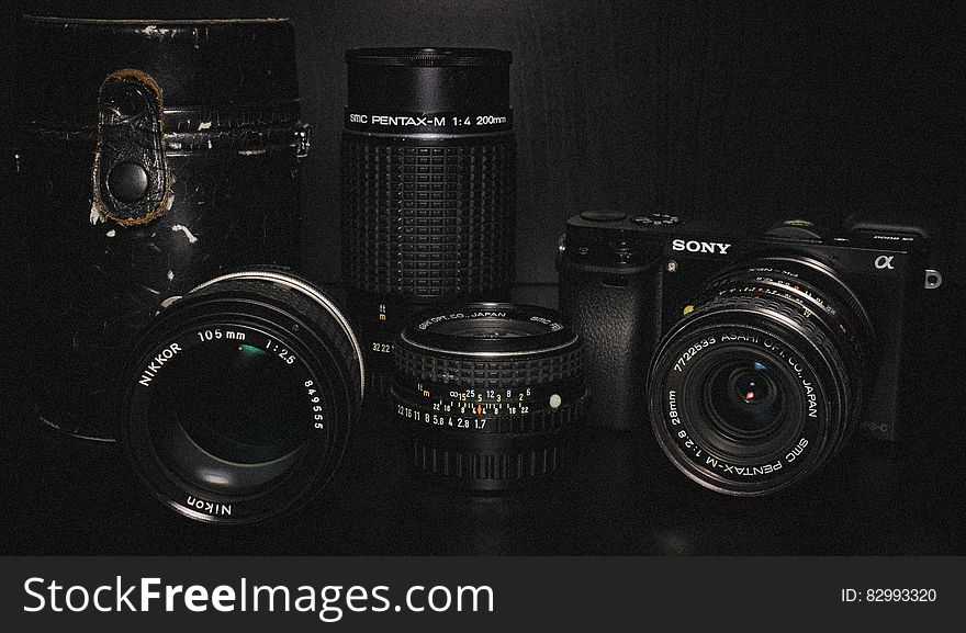 Black Sony Dslr Camera and Lens