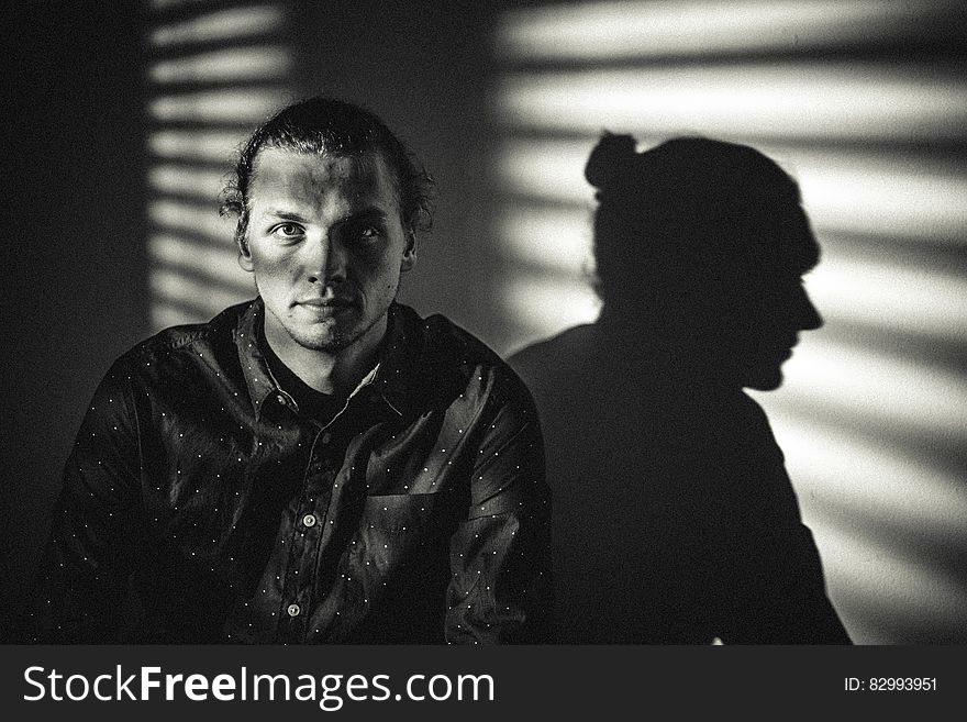 Studio Portrait Of Man In Shadows