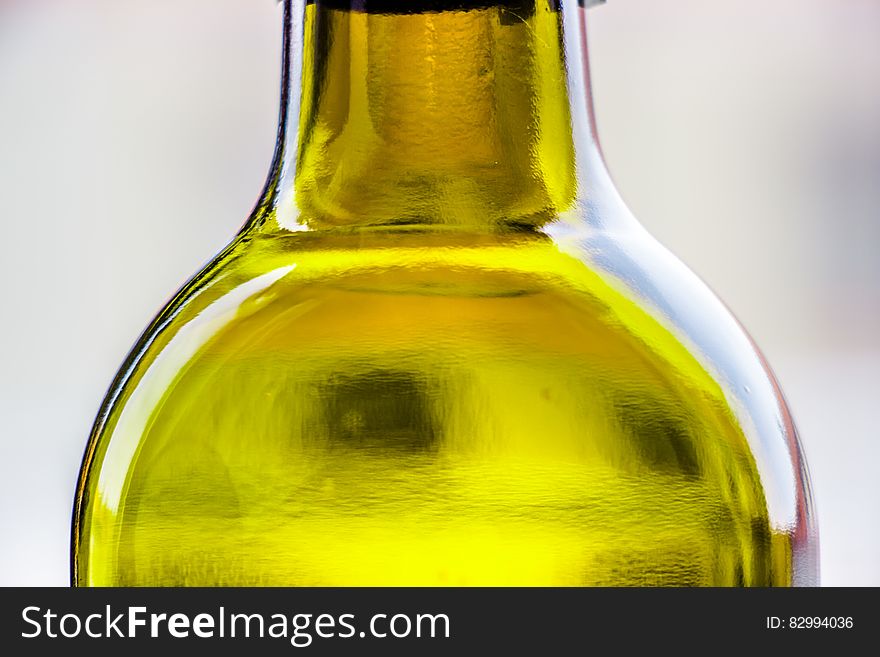 A close up of the neck of a bottle. A close up of the neck of a bottle.