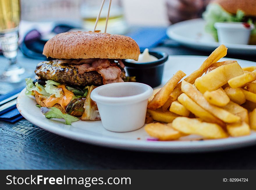 Fries And Burger On Plate