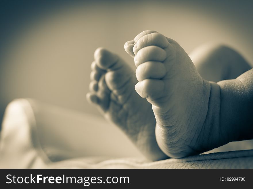 Baby&x27;s Feet In Gray Scale Photography