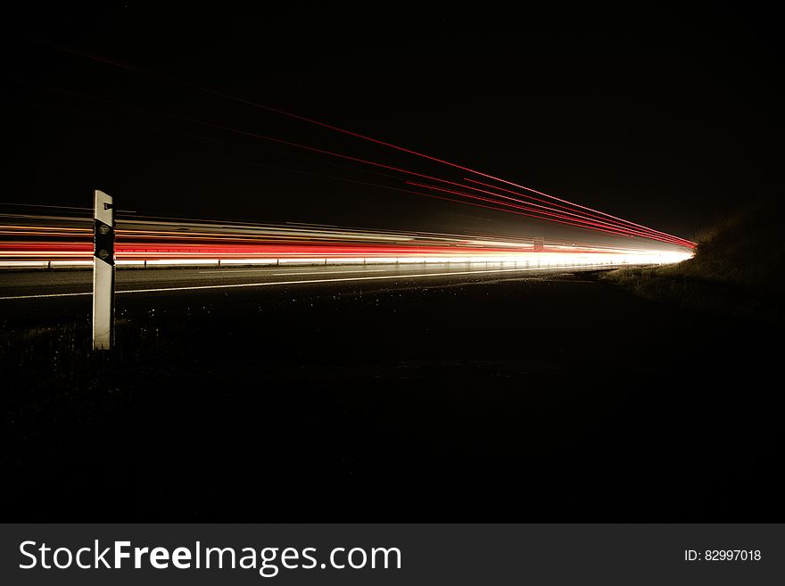 Night Photo of Car Lights on Bridge