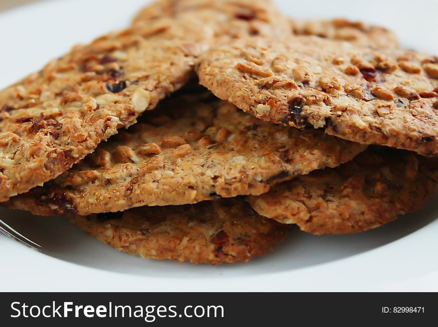 Brown Round Cookies Serve On White Ceramic Plate