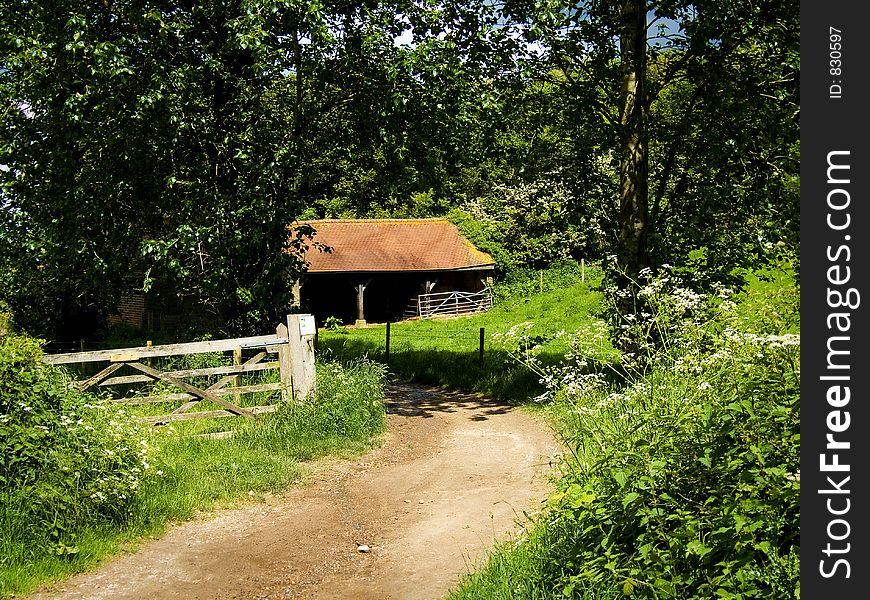 Path leading to a barn