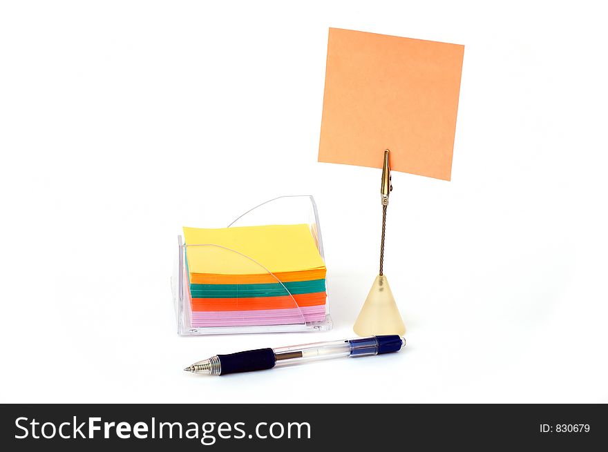 Blank note on stand with stack of notes in holder and pen -look in profile for more