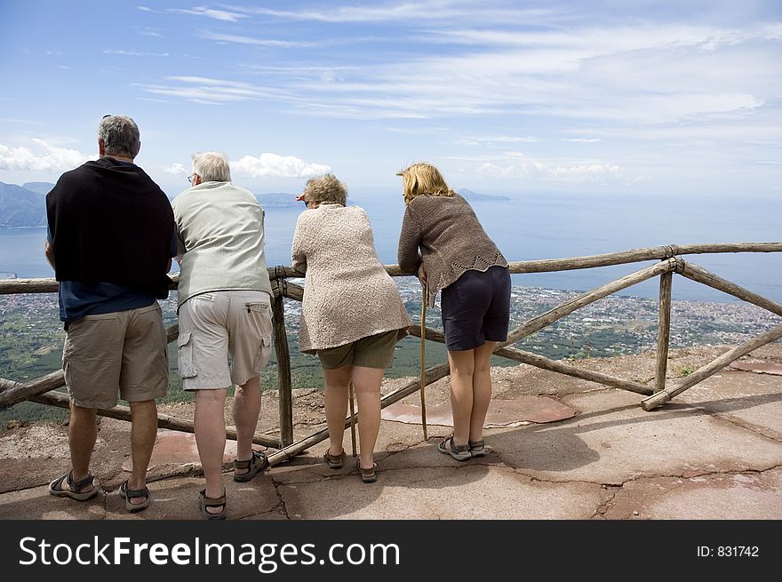 People viewing at a stunning view from Vesuvio volcano near Napoli, Italy. People viewing at a stunning view from Vesuvio volcano near Napoli, Italy