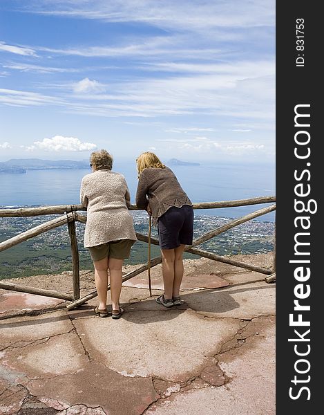 People viewing at a stunning view from Vesuvius volcano near Napoli, Italy. People viewing at a stunning view from Vesuvius volcano near Napoli, Italy