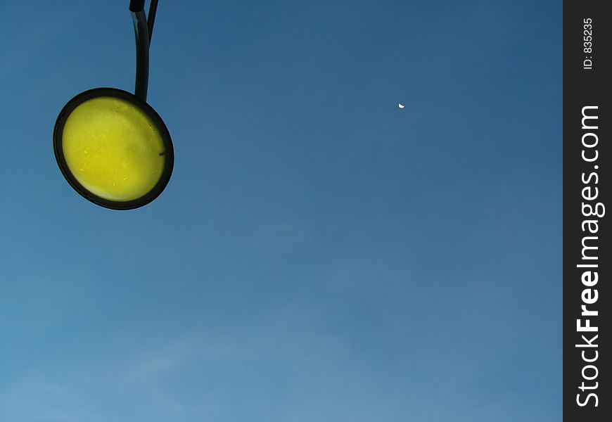 Street lamp against steel blue evening sky. Street lamp against steel blue evening sky