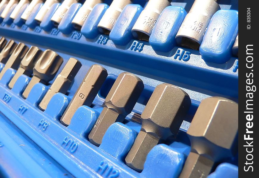 Screwheads and lugs nicely lined-up inside their toolbox