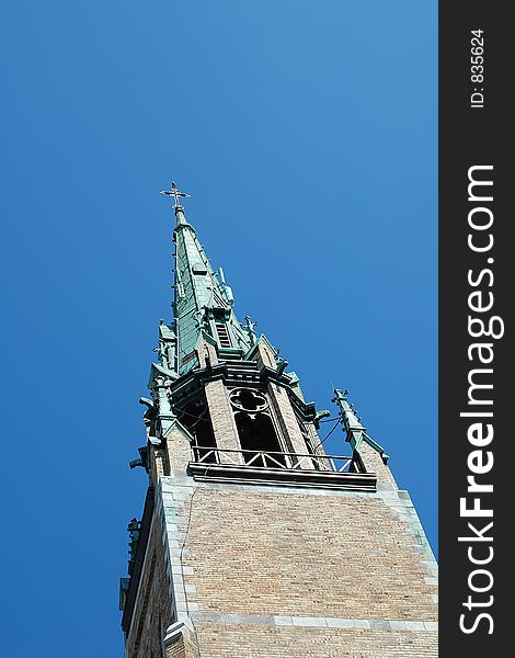 Bell-tower of church on sky