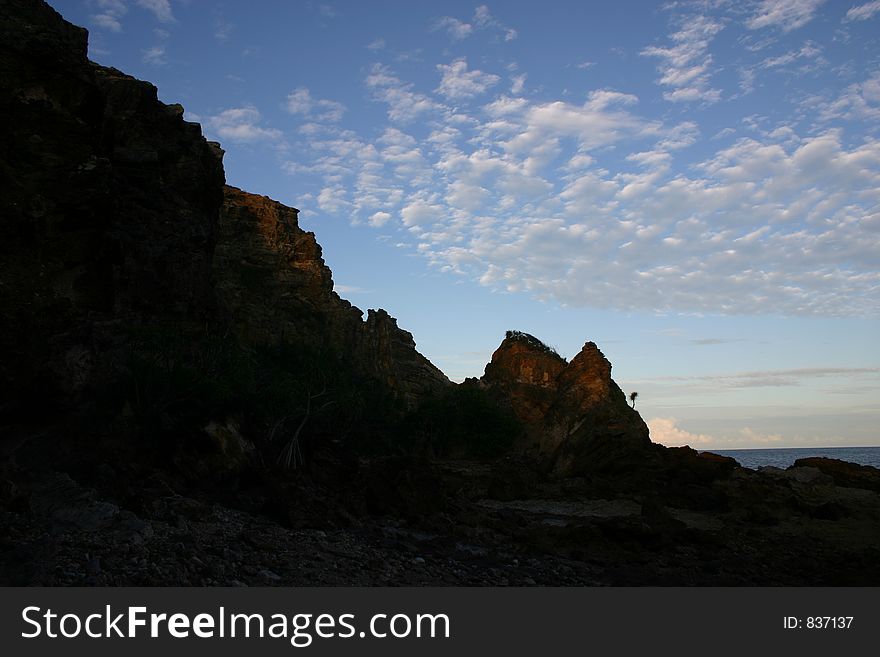 Rugged coastline silhouette