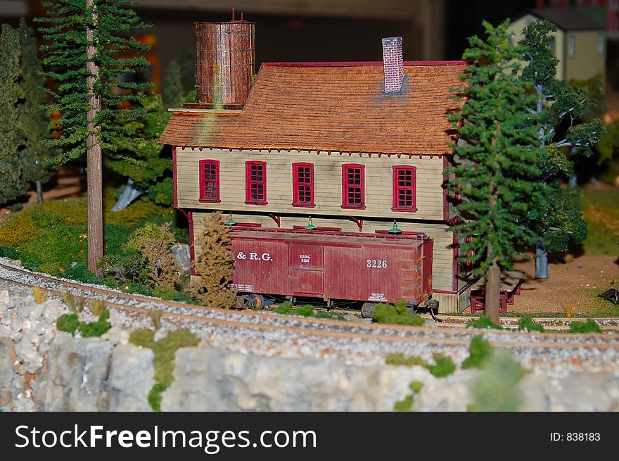 Brewery and Box Car on a Miniature Train Layout. Brewery and Box Car on a Miniature Train Layout