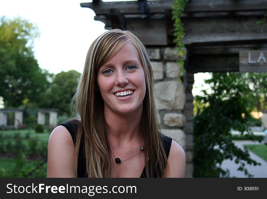 Woman posing in a garden. Woman posing in a garden