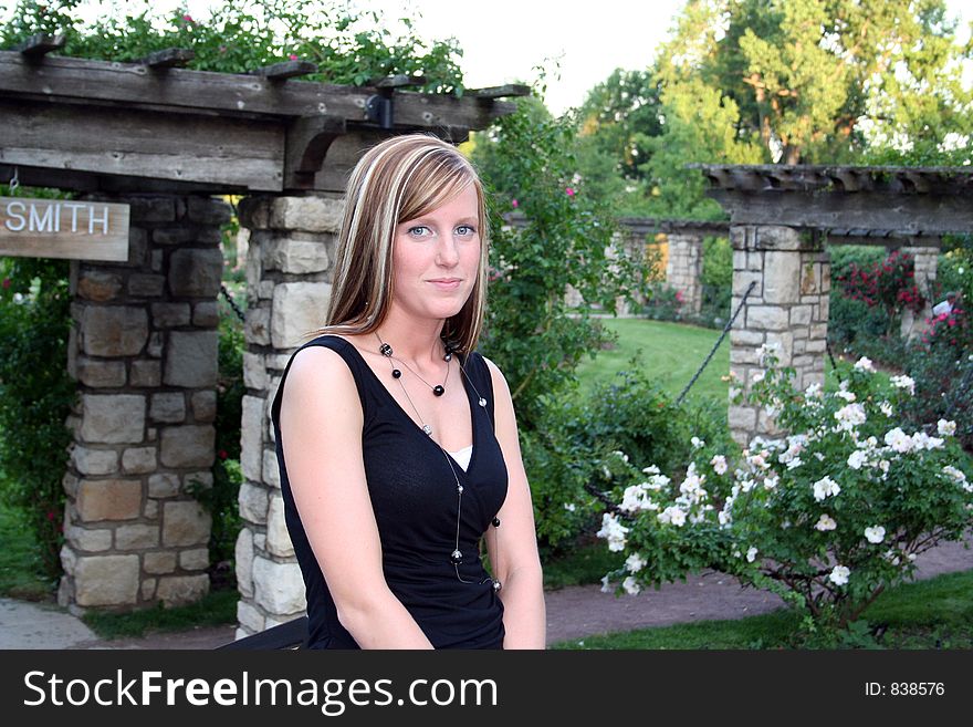 Woman posing in a garden. Woman posing in a garden