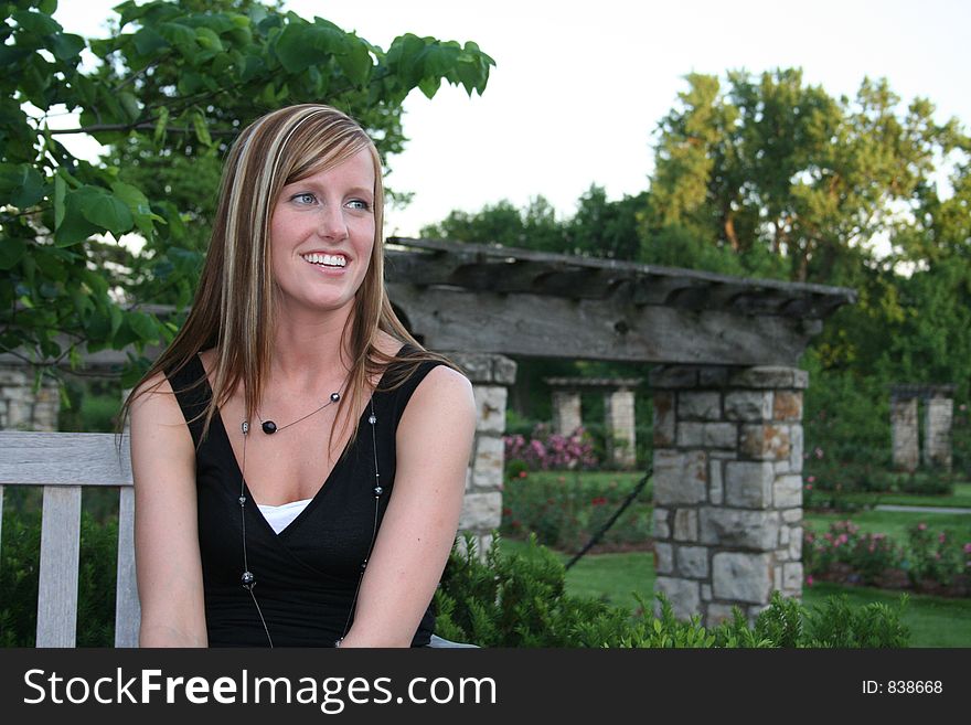 Woman posing in a garden. Woman posing in a garden