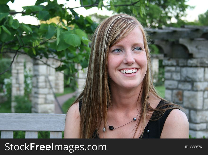 Woman posing in a garden. Woman posing in a garden