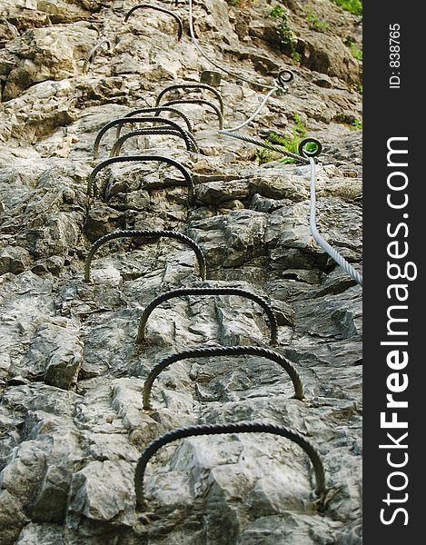 Metal steps on a mountain, for rock climbers. Metal steps on a mountain, for rock climbers.