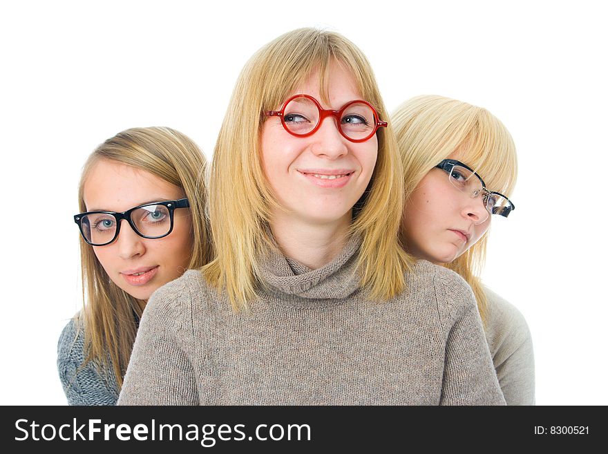 Three attractive girls isolated on a white background