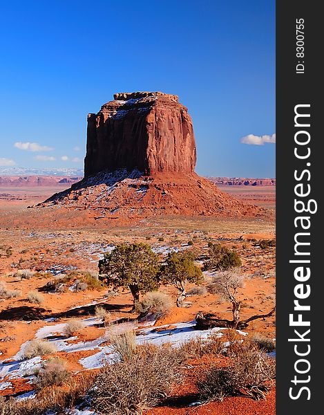 Beautiful Merrick Butte of the monument valley navajo tribal park with snow in the foreground. Beautiful Merrick Butte of the monument valley navajo tribal park with snow in the foreground