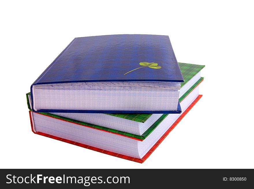 Three exercise books isolated on white