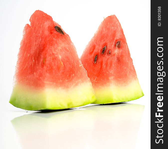 Juicy watermelon on a white surface