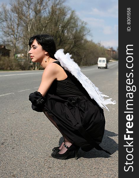 Lovely angel in road outdoors. Lovely angel in road outdoors