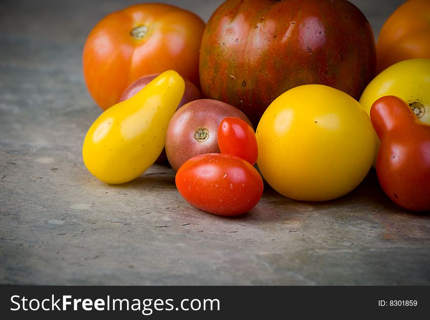 Collection of heirloom tomatoes of various colors. Collection of heirloom tomatoes of various colors.