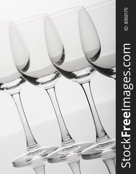 Empty wine glasses with reflections