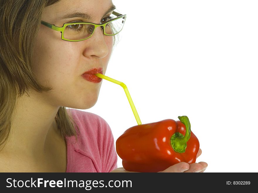 Nice girl drinking direct from the fruit