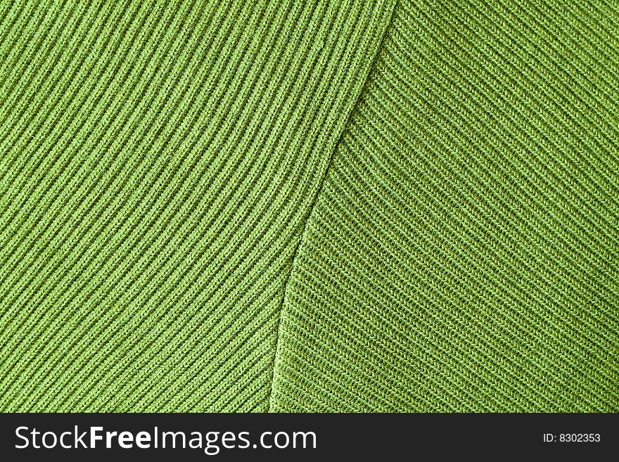 Green fabric with embroidery and decorations. Green fabric with embroidery and decorations