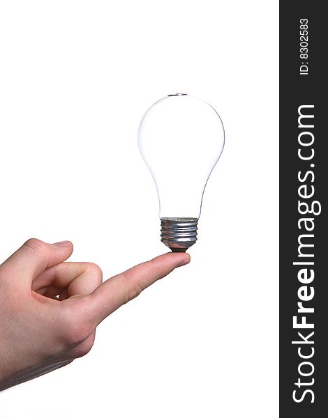 Person holding a green light bulb isolated on white