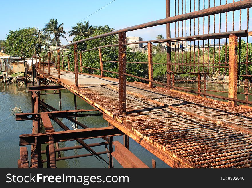 Old rusty iron bridge, in Santa Cruz del Norte, Havana, Cuba. Old rusty iron bridge, in Santa Cruz del Norte, Havana, Cuba