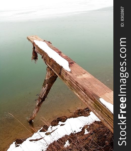 Winter jump board in lake