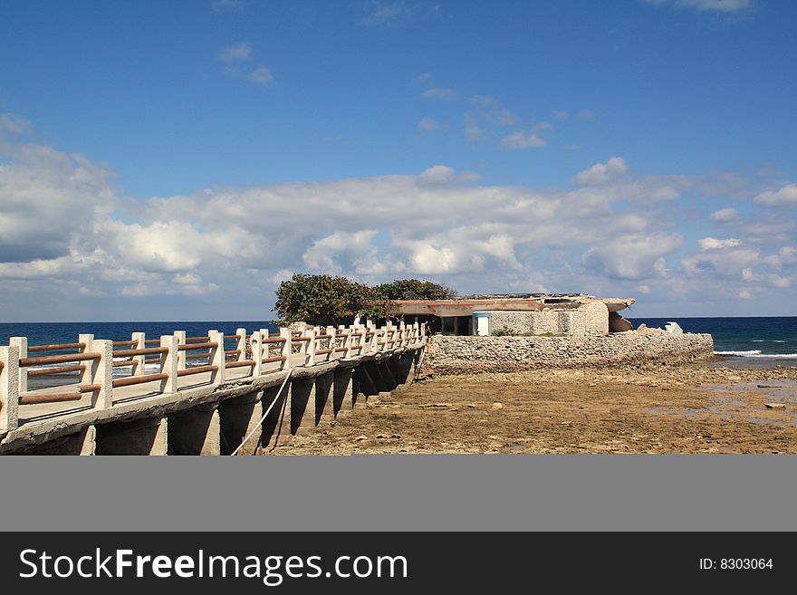 Abandoned club in a rocky seashore