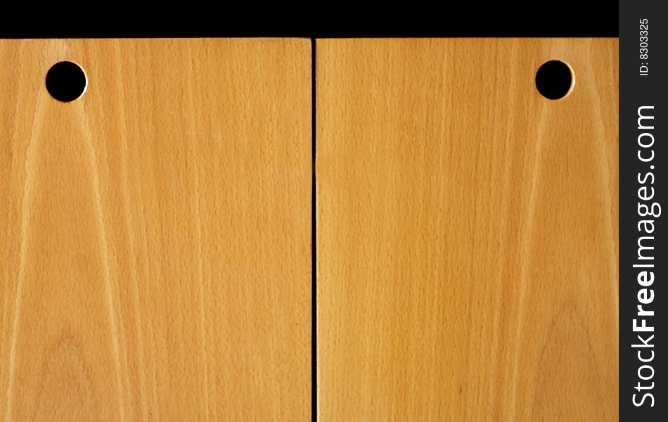 Panel of wood with holes blacks