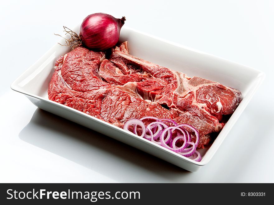 Raw beef cut kown as striploin or cote de boeuf