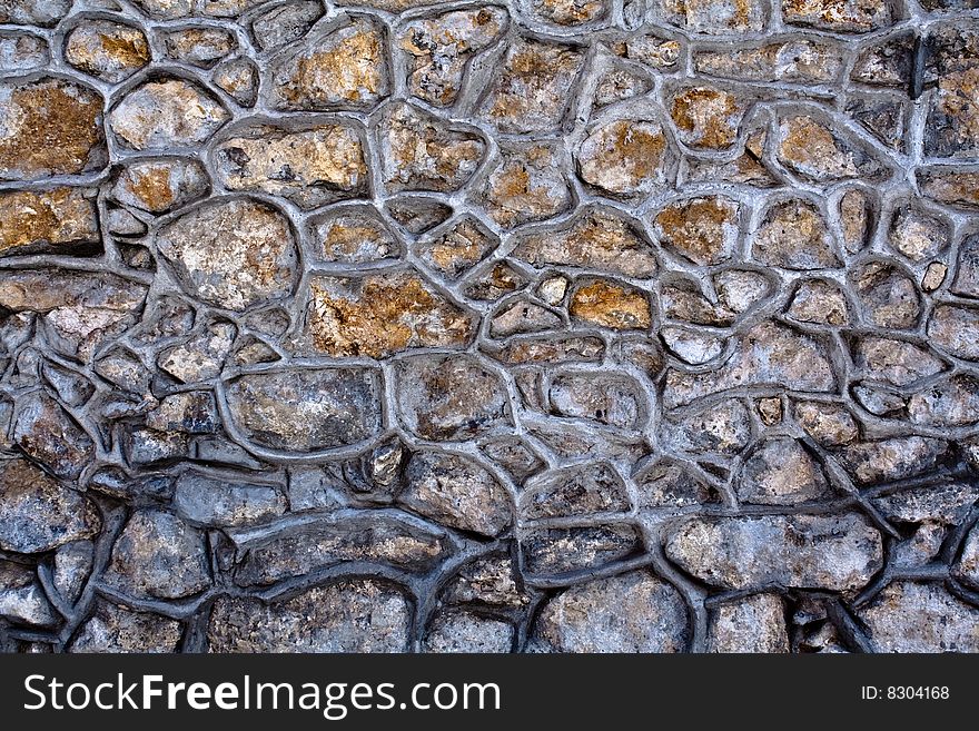 Stone wall in day light.