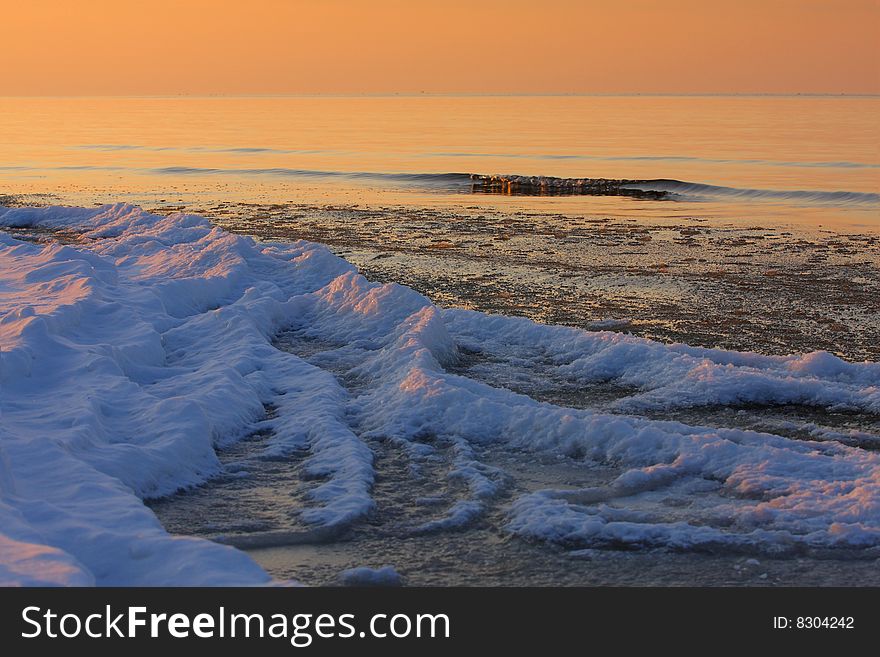 Serene sunset on the sea shore