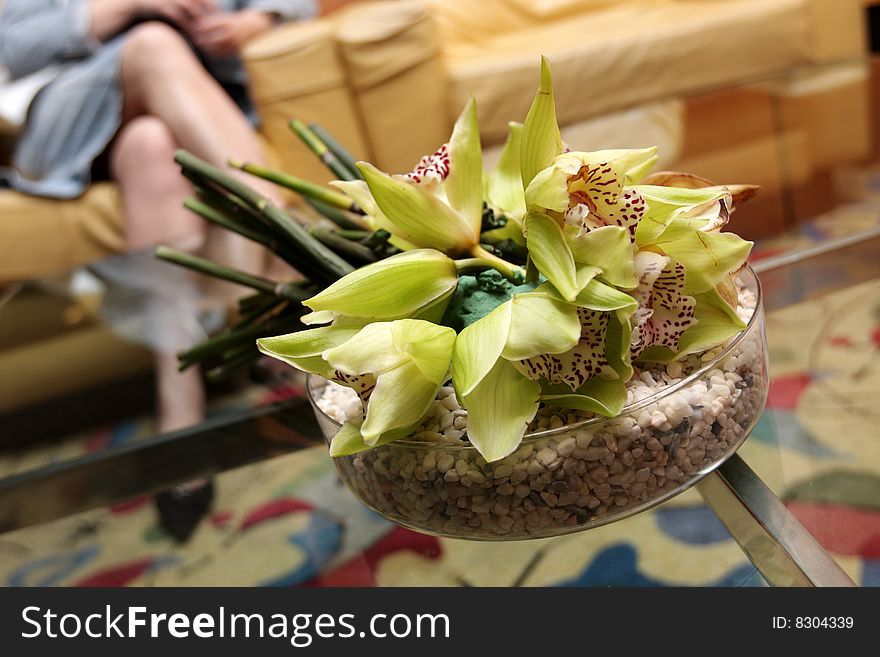 The bouquet of orchids in a hotel. The bouquet of orchids in a hotel
