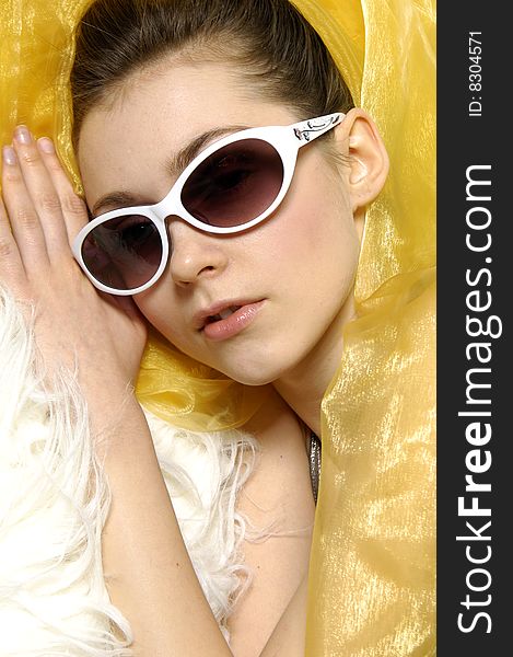 Fashion portrait of young, beautiful woman wearing sunglasses. Fashion portrait of young, beautiful woman wearing sunglasses