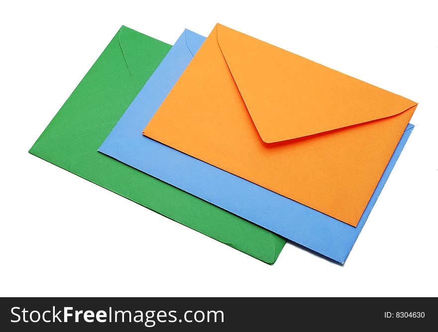 Three envelopes in different colors isolated on white