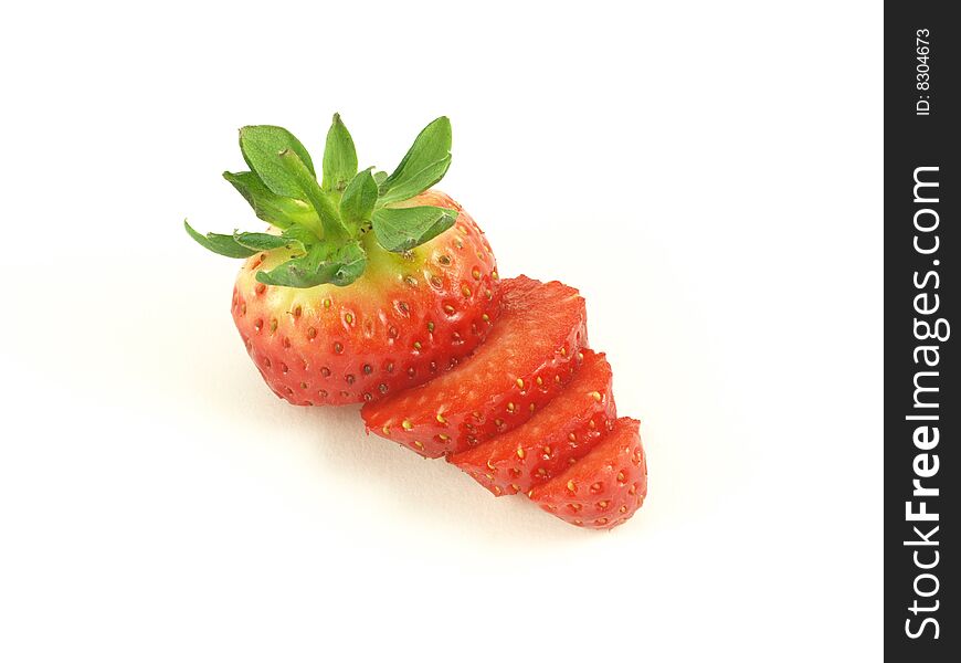 Sliced strawberry on white isolated background. Sliced strawberry on white isolated background.