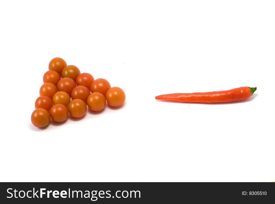 Snooker pyramid with red tomatos and chili