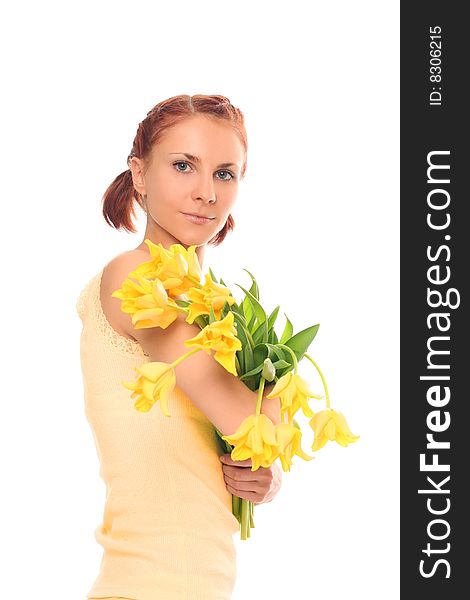 Cute young woman with yellow tulips. Cute young woman with yellow tulips