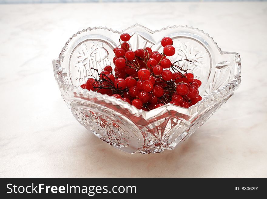 Berries in a crystal vase. Close-up. Berries in a crystal vase. Close-up.