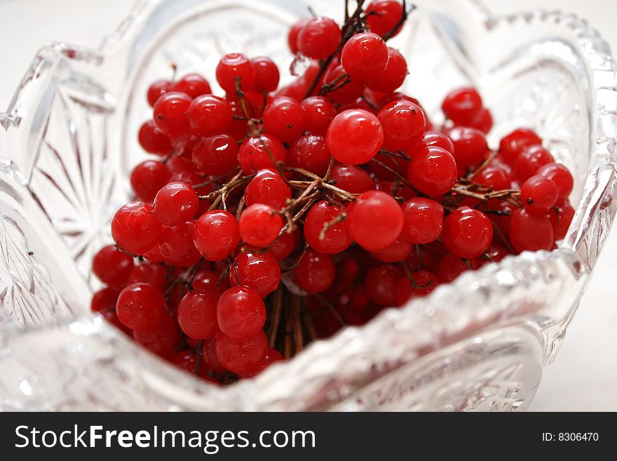 Berries in a crystal vase. Close-up. Berries in a crystal vase. Close-up.