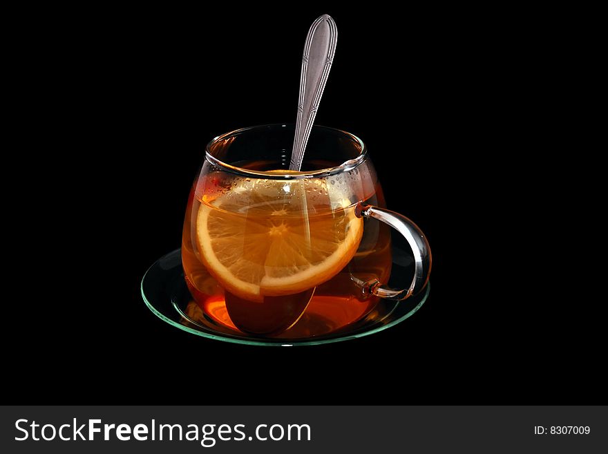 Cup of tea black background